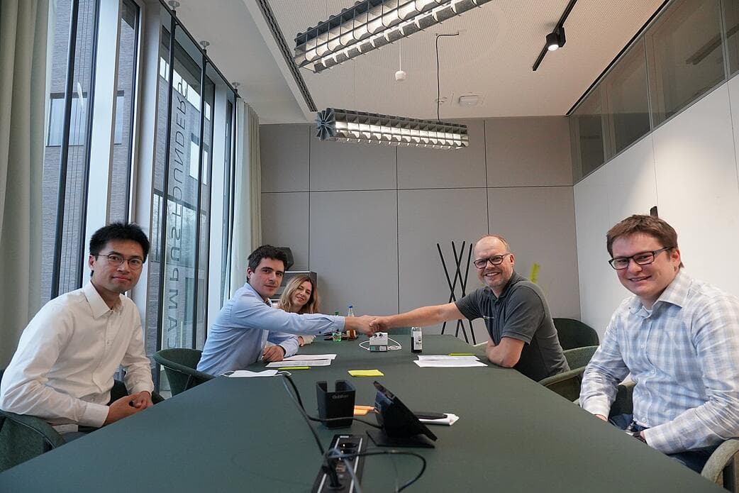 The IUNA AI founding team with Campus Founders representatives signing the pre-seed financing in Heilbronn